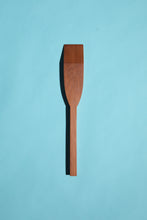 Load image into Gallery viewer, hand-made mataī mini spatulas with square handles and mitred tips, on a blue background.”