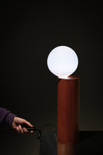 Load image into Gallery viewer, Handcrafted Balanced Lamp, featuring a unique design with a hand-blown glass shade and a wooden base made from reclaimed native timber