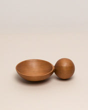 Load image into Gallery viewer, A hand carved spoon made of rosewood on a white back ground, the spoon bowl is deep and round and the handle is a hand carved sphere.