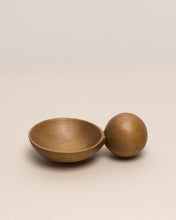 Load image into Gallery viewer, A hand carved spoon made of kauri on a white back ground, the spoon bowl is deep and round and the handle is a hand carved sphere.