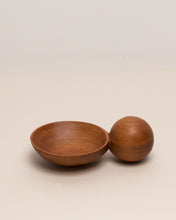 Load image into Gallery viewer, A hand carved spoon made of Tōtara on a white back ground, the spoon bowl is deep and round and the handle is a hand carved sphere.