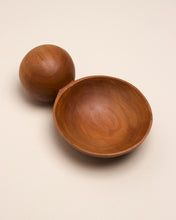 Load image into Gallery viewer, A hand carved spoon made of Tōtara on a white back ground, the spoon bowl is deep and round and the handle is a hand carved sphere.