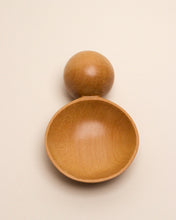 Load image into Gallery viewer, A hand carved spoon made of kauri on a white back ground, the spoon bowl is deep and round and the handle is a hand carved sphere.
