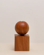 Load image into Gallery viewer, Hand-carved candle holder made from Tōtara wood, featuring a spherical base atop a square block.