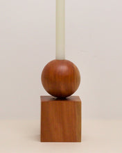 Load image into Gallery viewer, Hand-carved candle holder made from Tōtara wood, featuring a spherical base atop a square block.