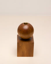Load image into Gallery viewer, Hand-carved candle holder made from kauri wood, featuring a spherical base atop a square block.