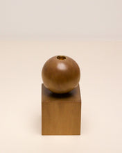 Load image into Gallery viewer, Hand-carved candle holder made from kauri wood, featuring a spherical base atop a square block.