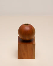 Load image into Gallery viewer, Hand-carved candle holder made from Tōtara wood, featuring a spherical base atop a square block.