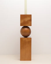 Load image into Gallery viewer, Hand-carved kauri candleholder from the Moon Series, featuring a spherical base atop a square block.