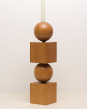 Load image into Gallery viewer, Hand-carved kauri candleholder from the Moon Series, featuring a spherical base atop a square block.