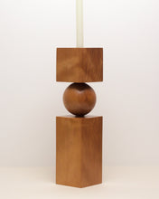 Load image into Gallery viewer, Hand-carved kauri candleholder from the Moon Series, featuring a spherical base atop a square block.