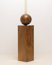 Load image into Gallery viewer, Hand-carved swamp kauri candleholder, featuring a spherical base atop a square block, part of the Moon Series collection.