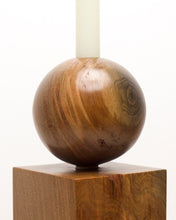 Load image into Gallery viewer, Hand-carved swamp kauri candleholder, featuring a spherical base atop a square block, part of the Moon Series collection.