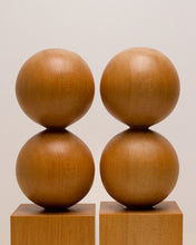 Load image into Gallery viewer, Hand-carved kauri candleholder from the Moon Series, featuring a double height spherical base atop a square block.