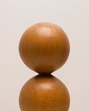 Load image into Gallery viewer, Hand-carved kauri candleholder from the Moon Series, featuring a double height spherical base atop a square block.