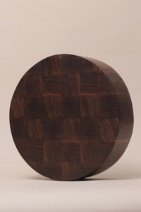 Handcrafted large round end grain chopping board made from high-quality Walnut, showcasing a durable and visually striking design.