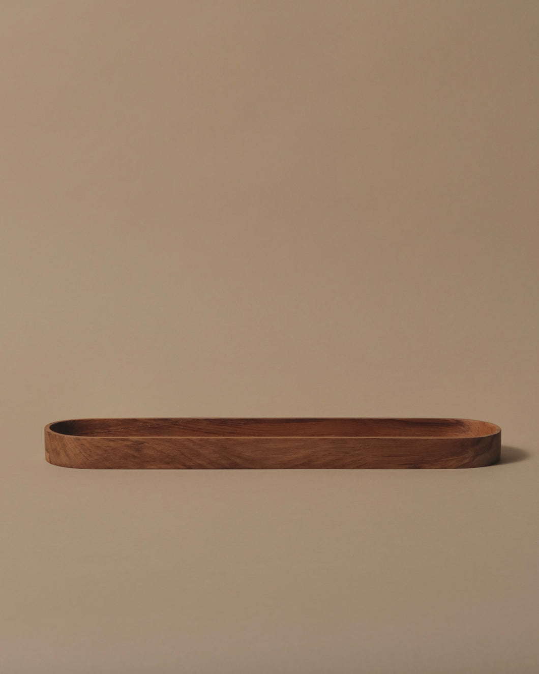 Long tray with square base hand crafted in Rimu.