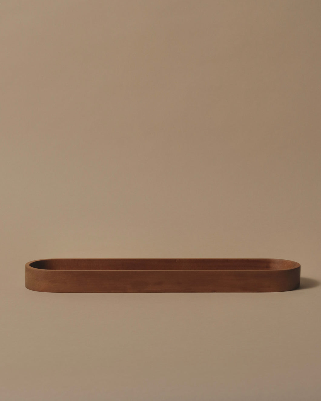 Long tray with square base hand crafted in Swamp Kauri.