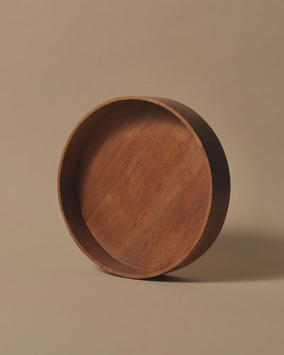 Large round handcrafted Swamp Kauri bowl with a flat base and a square edge.