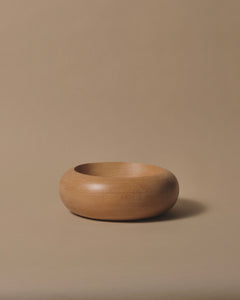 Rounded bowl made from kauri, deep smooth bowl and soft round edge.