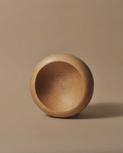 Rounded bowl made from kauri, deep smooth bowl and soft round edge.