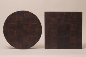 Handcrafted large round and a large square end grain chopping board made from high-quality Walnut, showcasing a durable and visually striking design.